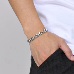 Men's hip hop stainless steel handmade link chain bracelet shown on a male wrist