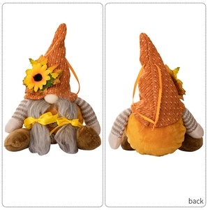 Front and back view of a Thanksgiving gnome with knit hat and sunflower details