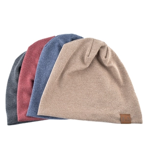 Knitted slouchy beanies in four colors with leather FS patch for autumn and winter outdoor wear