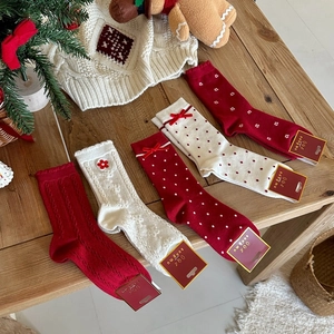 Winter festive red and white thermal crew socks set with cute bows and knit patterns