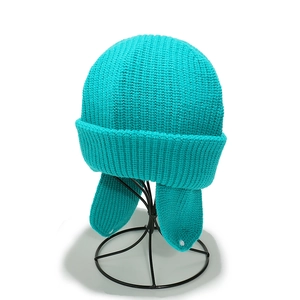 Winter knit trapper hat for children in bright turquoise with cozy ear flaps and thick knit