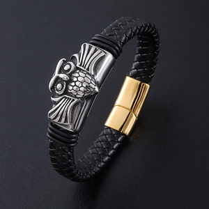 Braided black leather bracelet with silver owl ornament and golden magnetic clasp