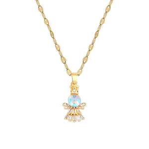 Macro view of gold angel pendant featuring aurora gemstone and flat chain links