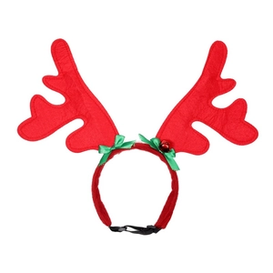 Detail of Christmas reindeer antler headband for large dogs with green bow and jingle bells