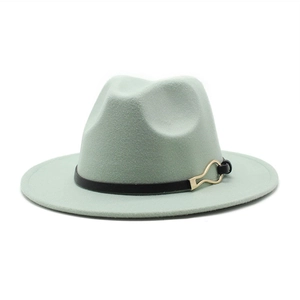 Detail of mint green wool fedora with black leather band and golden teardrop buckle
