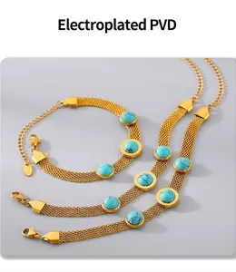 Detail of PVD gold plated mesh bracelet with turquoise stone inlay on a purple background