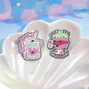 Cartoon strawberry enamel pins set featuring soda can and strobbery designs on shell tray