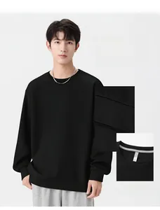 Detailed view of the honeycomb texture on a black men's crewneck jacquard sweatshirt