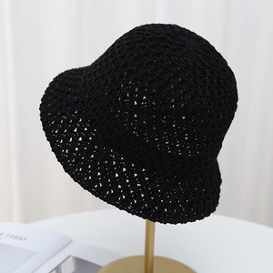 Breathable black crochet knit bucket hat with hollow mesh design for sun protection