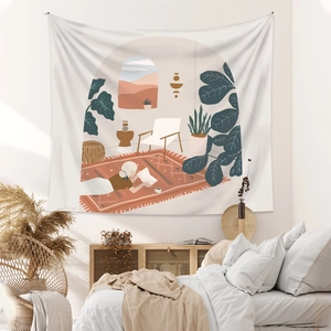Detail of bohemian wall tapestry featuring a modern home reading illustration in earthy tones