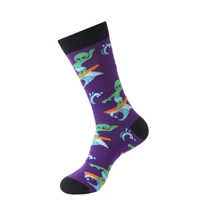 Detail of purple cotton sock featuring surfing alien patterns with black heel and toe