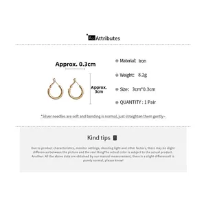 Detailed specs of 3cm gold hoop earrings with silver needles weighing 8.2g