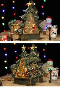Retro bronze Christmas tree music box with spinning snow inside the glass globe