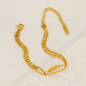 Minimalist double layer stainless steel gold bracelet with feather pendant and cuban chain