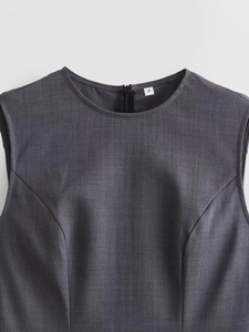 Detail shot of a dark grey sleeveless dress crew neckline with high-quality fabric texture