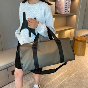 Large capacity metal grey travel bag with luggage strap and wet-dry separation feature