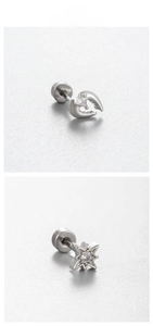 Detailed view of silver screw back earrings with heart and star-shaped zircon inlays