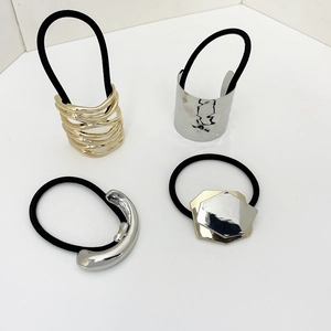 Minimalist alloy hair ties in gold and silver finishes with geometric metal ornaments