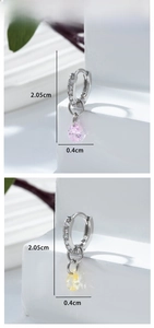 Detail of zircon heart drop earrings with pink and yellow stones measuring 2.05cm in height
