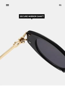 Détail de la charnière sécurisée avec monture noire et branche dorée sur lunettes punk