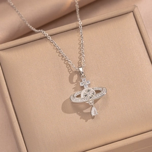 Elegant multi-layered Saturn pendant necklace with sparkling crystals and a pearl drop