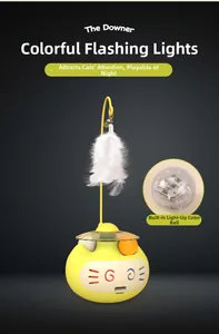 Detail of yellow tumbler cat toy with built-in glowing light ball and feather bell