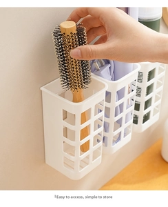 Detail of wall-mounted organizer showing easy access for hair tools and combs