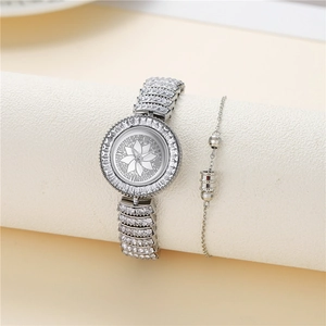 Detailed macro view of silver quartz watch set with rhinestones and floral dial pattern
