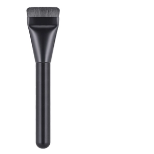 Professional flat top foundation brush with dense bristles and sleek black handle