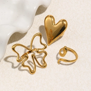 Three-piece set of 18K gold plated stainless steel rings featuring heart and snake designs