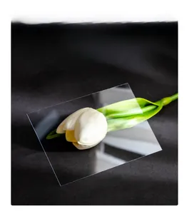 Macro shot of high-transparency acrylic panel showing smooth edges on a tulip flower