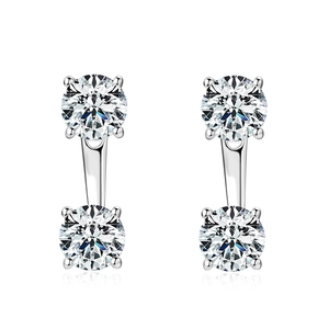 Macro detail of S925 sterling silver earrings featuring round moissanite dual-stone studs