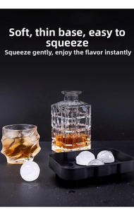 Detail of black silicone skull ice mold showing easy-release design with clear ice balls