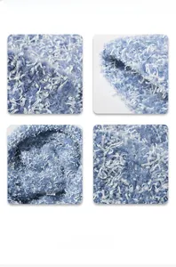 Macro view of plush knit fabric texture and washing label for winter beanie hat