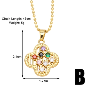 Detail view of gold heart pendant with colorful zircon stones and dimension specifications