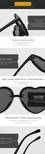 Close-up of black heart-shaped sunglasses featuring metallic hinges and ergonomic temples