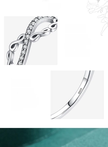 Macro detail of S925 sterling silver infinity ring with hand-set 5A cubic zirconia