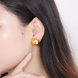 Minimalist hollow gold dome earrings for women with high polished metallic finish