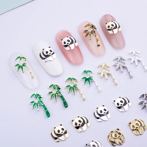 Panda and bamboo alloy nail art charms with golden finish and green enamel details
