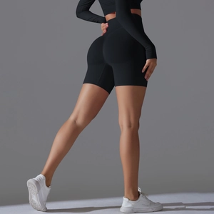 Close-up of black high-waisted seamless yoga shorts with butt-lifting texture for fitness