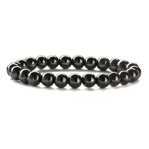 Polished natural tiger eye and hematite beaded elastic bracelet in a minimalist style
