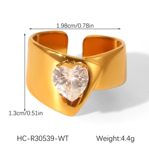 Detailed top view of gold heart zircon ring showing 1.98cm diameter and adjustable band