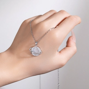 Elegant cat eye stone planet necklace with sparkling cubic zirconia on silver chain