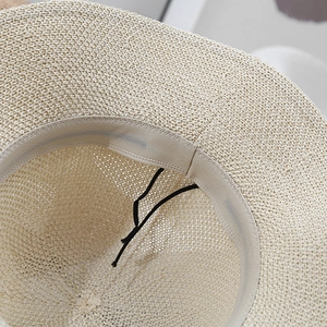 Cappello da sole in maglia con tesa larga ondulata, rete traspirante e laccio regolabile
