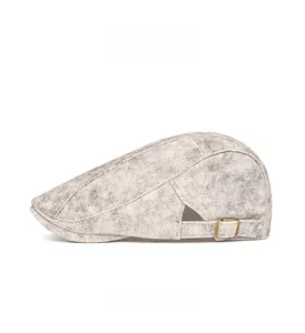 Detailed side view of vintage washed flat cap featuring adjustable metal buckle