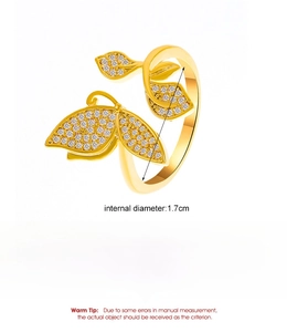 Detailed view of gold butterfly ring with copper material and 3.2g weight specifications