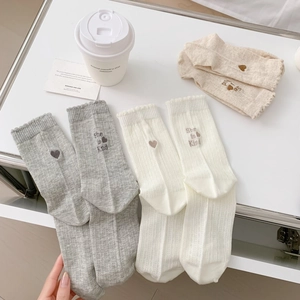 Women's mesh crew socks with heart embroidery and She is Kind text in multiple colors
