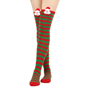 Detail of festive red and green striped over-knee socks with 3D Santa Claus figure