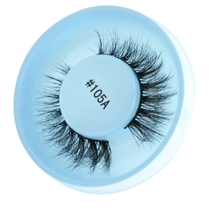 Close-up of thick black false eyelashes in a blue round case showing model #105A detail