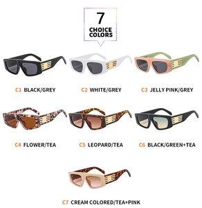 Detailed flat lay of fashion sunglasses in seven assorted colors and lens gradients